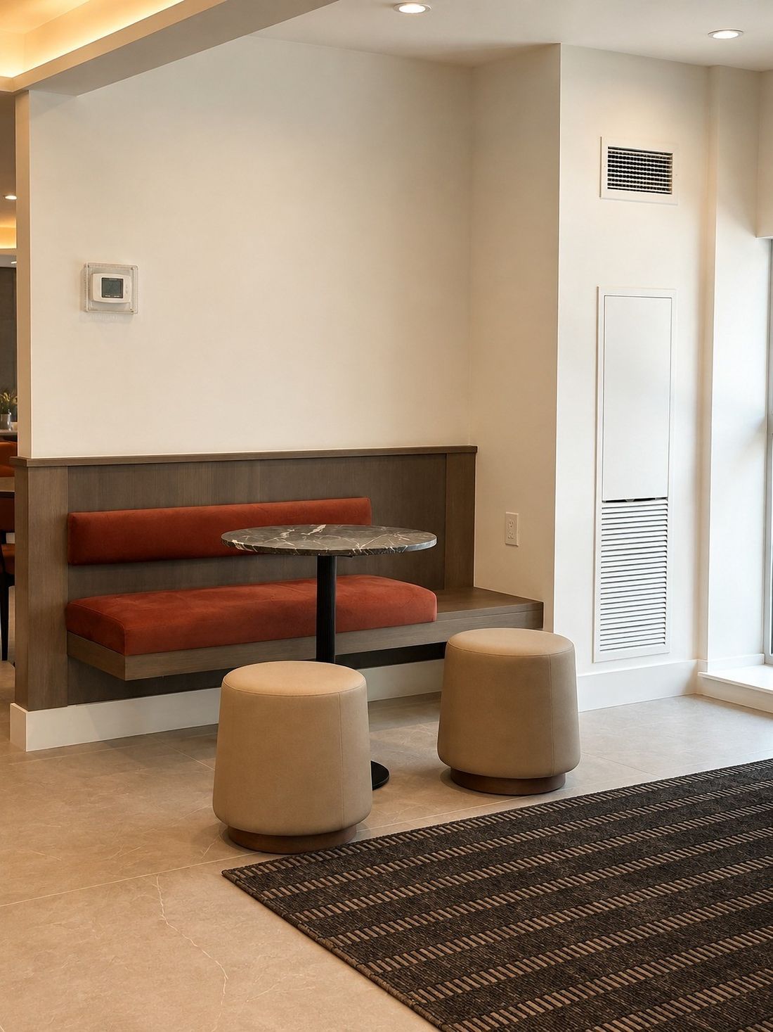 Banquette seating — The Courtyard Tower, Queen West, Toronto — interior design by RZ Interiors