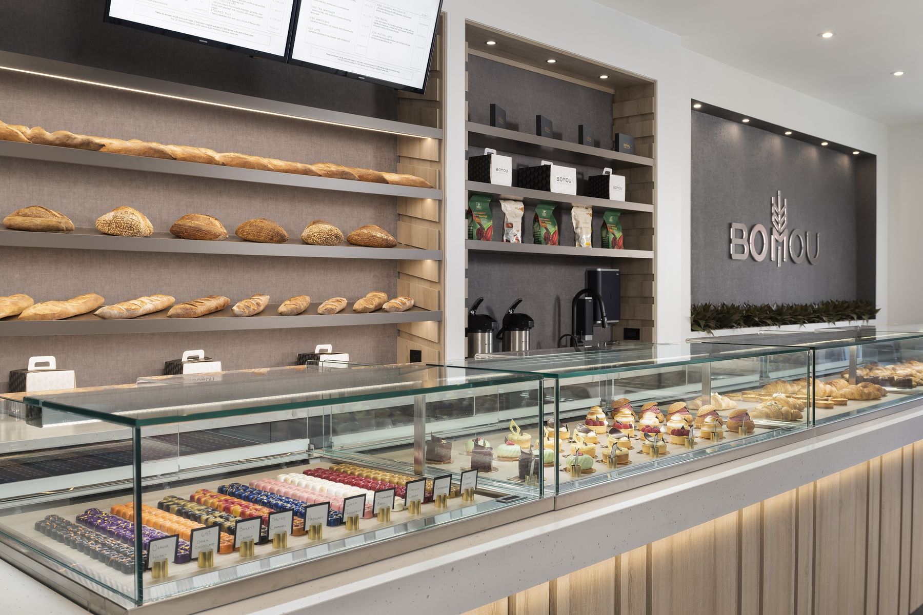 Bread wall and pastry case — Bomou on Bayview, East York, Toronto — interior design by RZ Interiors
