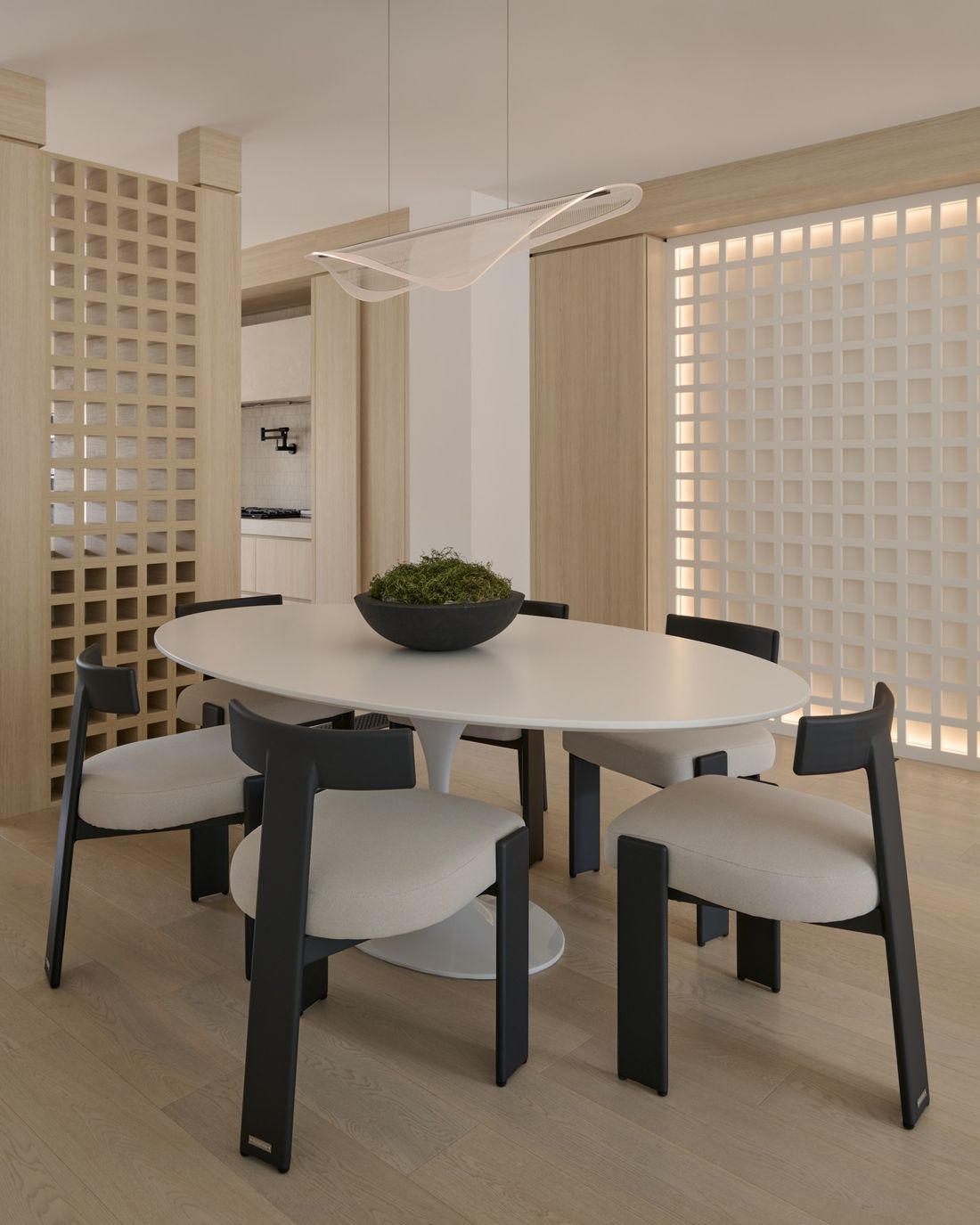 Dining room and screen, lights on — The Void — interior design by RZ Interiors