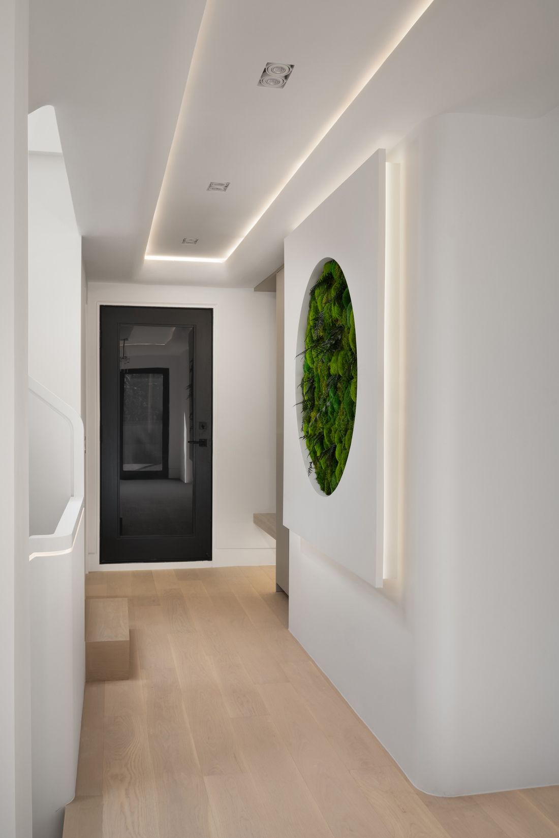 Entry with the sculptural moss wall — The Open House, Moore Park, Toronto — interior design by RZ Interiors