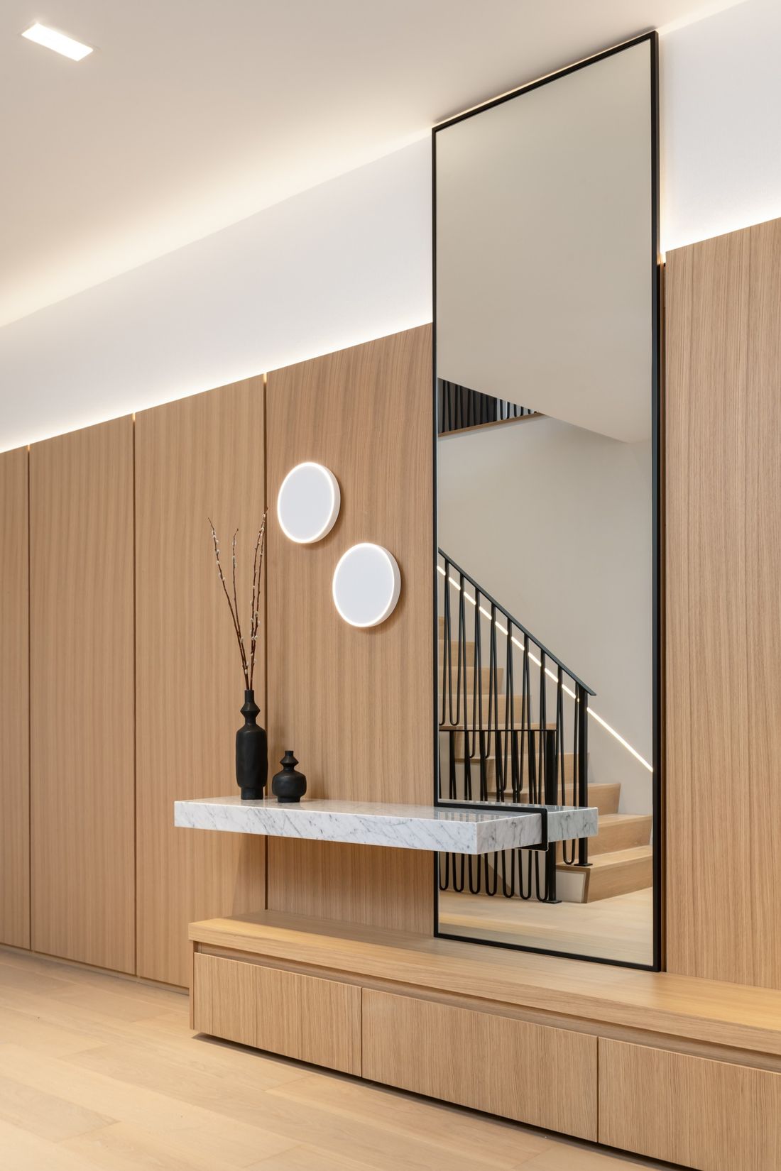 Foyer mirror and ledge — The Frame, Kleinburg, Vaughan — interior design by RZ Interiors