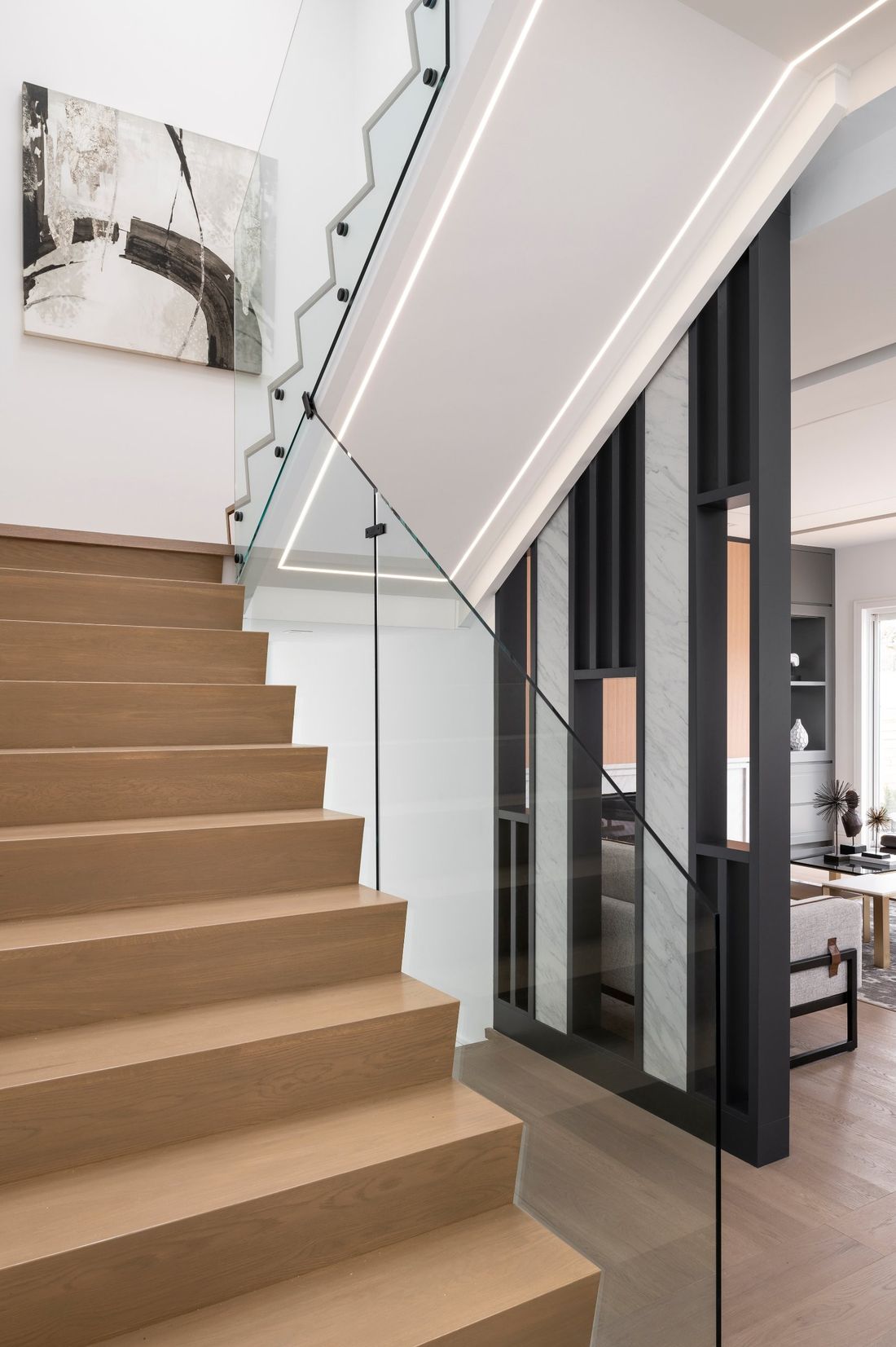 Glass stair and lit ceiling — Two Volumes, North York, Toronto — interior design by RZ Interiors