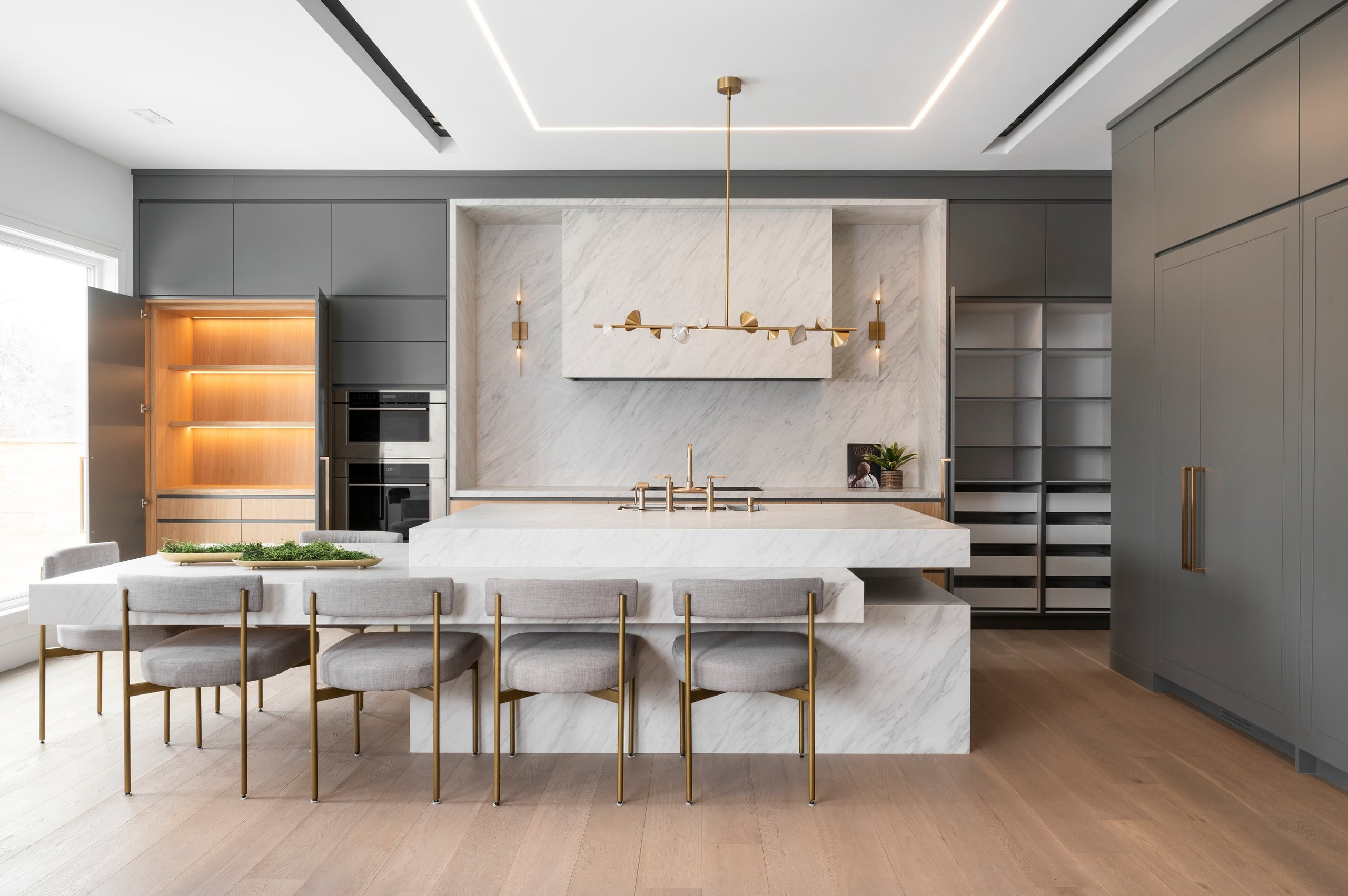 Kitchen, the pantry walls open, open — Two Volumes, North York, Toronto — interior design by RZ Interiors