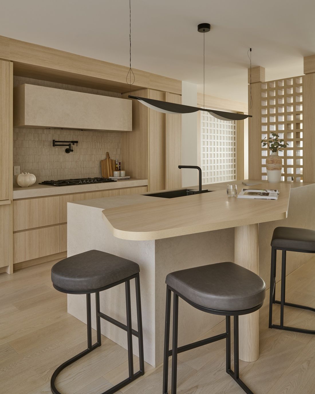 Kitchen with cove lighting, lights off — The Void — interior design by RZ Interiors