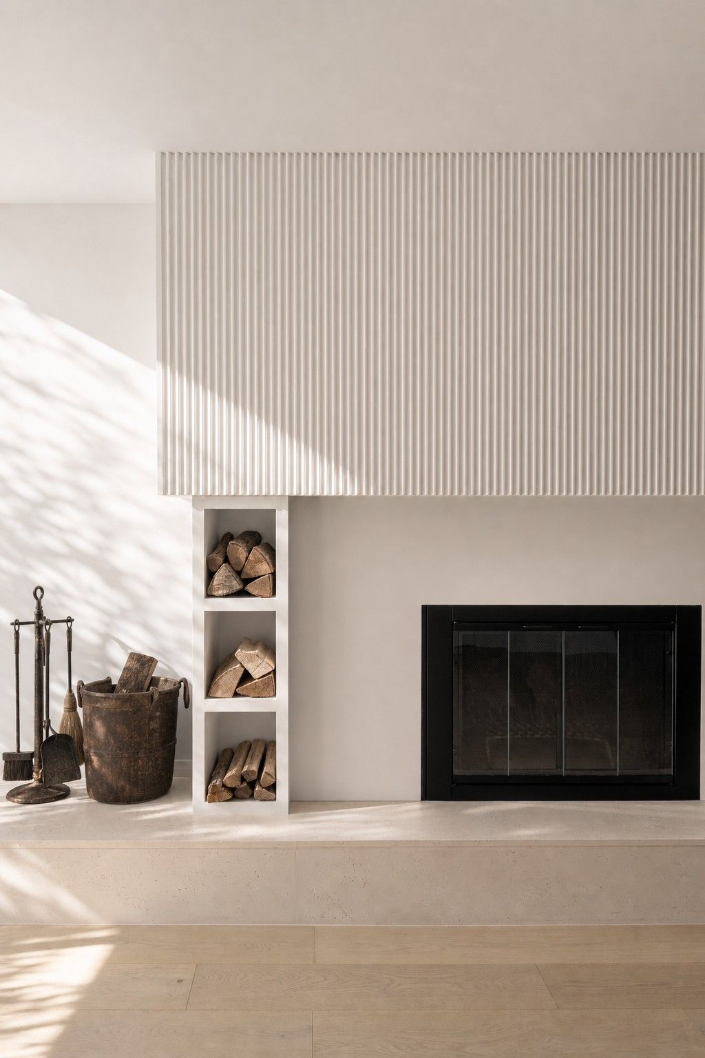 Lower-level fireplace — Curvilinear Forms, Greater Toronto Area — interior design by RZ Interiors
