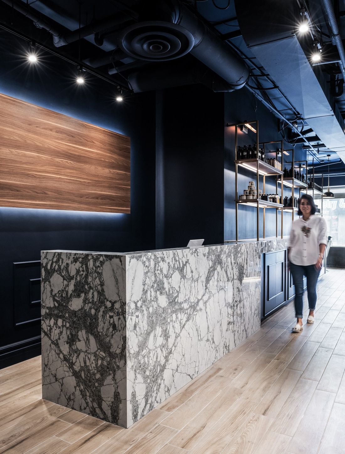 Marble reception desk — Aurora Barber, Aurora, Ontario — interior design by RZ Interiors