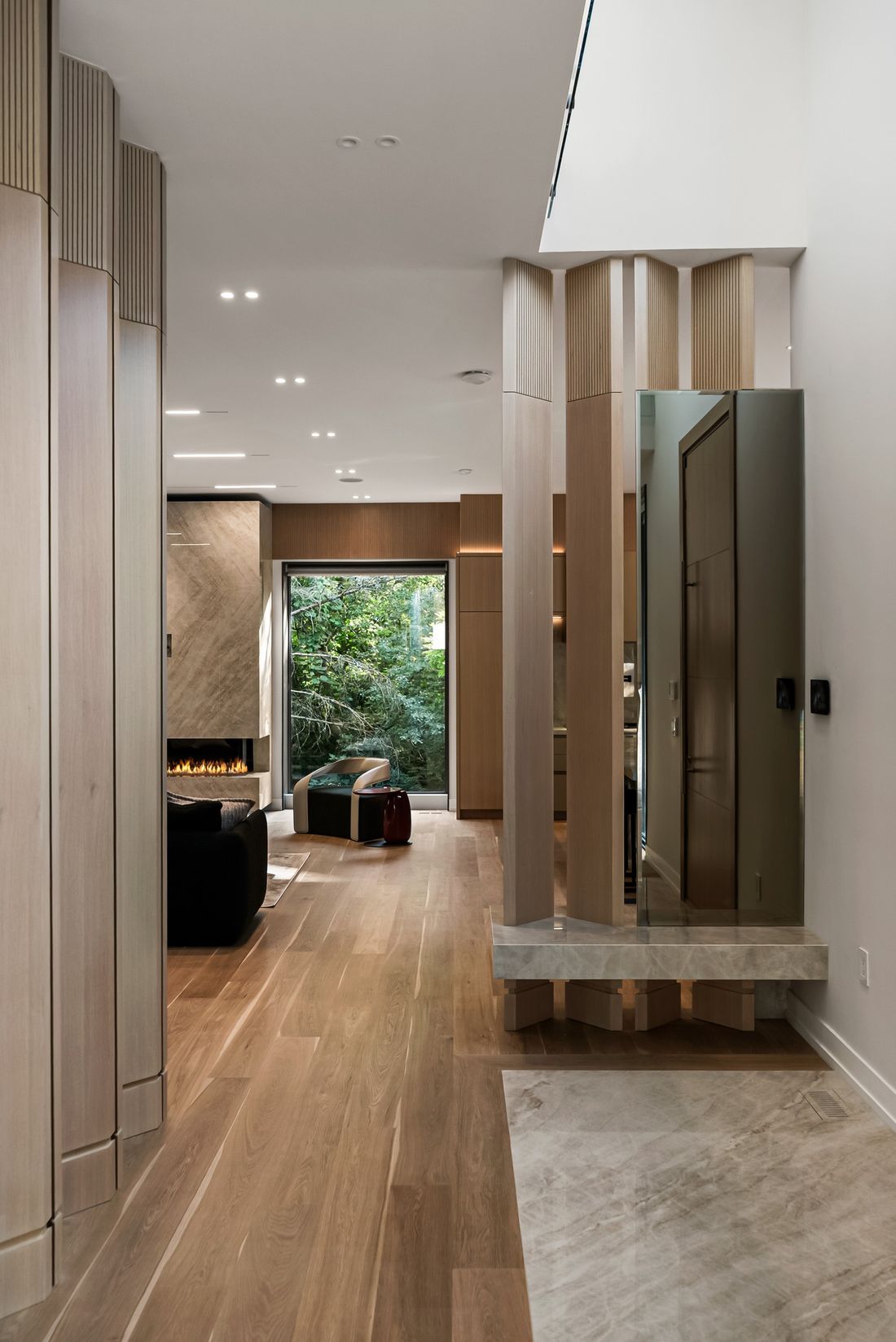 Oak screens at the entry — The Offset, Toronto — interior design by RZ Interiors