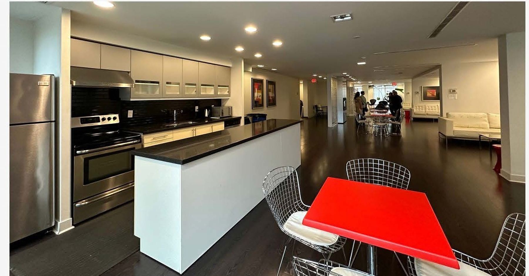 Party room to community lounge, before — The Courtyard Tower, Queen West, Toronto — interior design by RZ Interiors