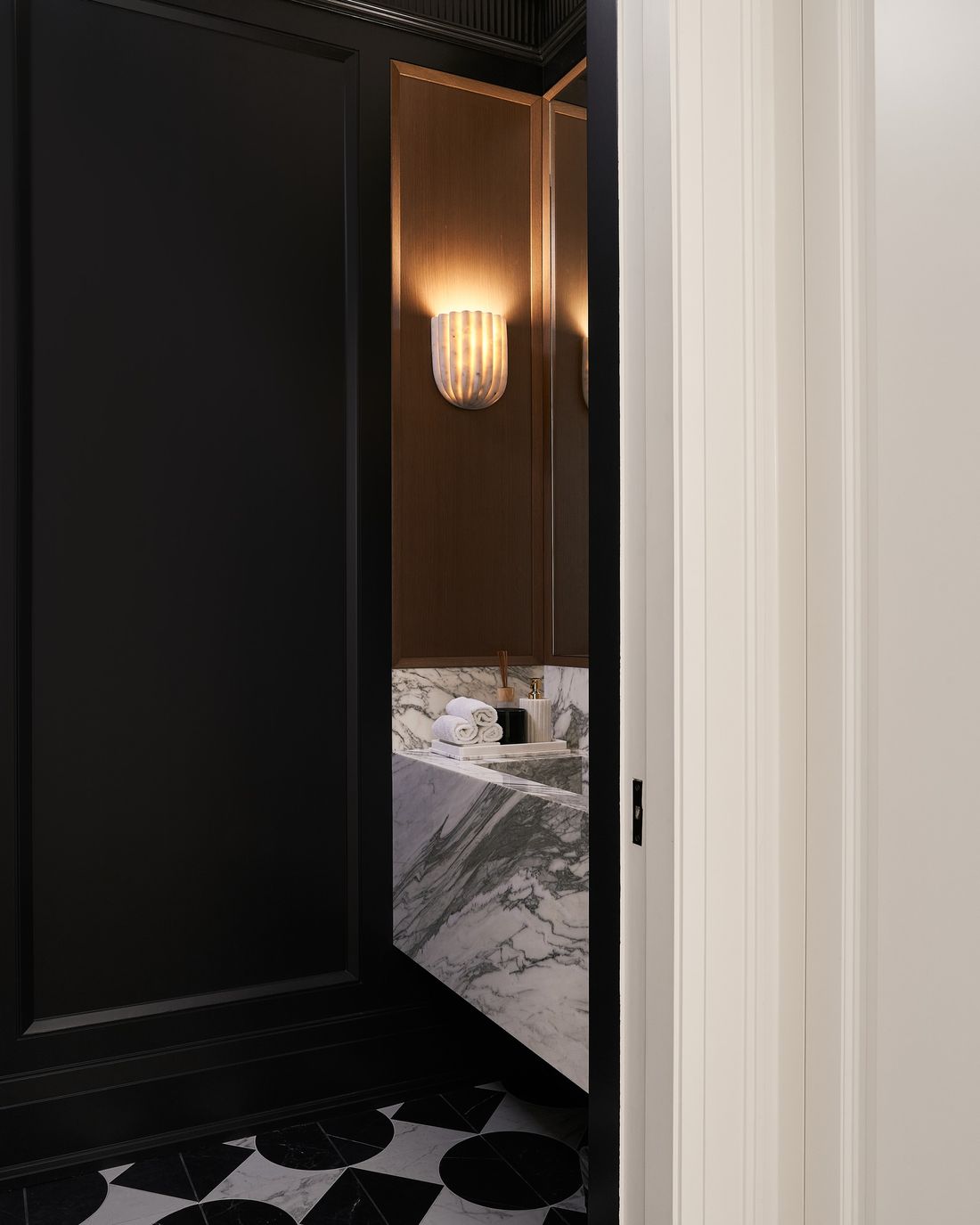 Powder room door — House Number Three — interior design by RZ Interiors