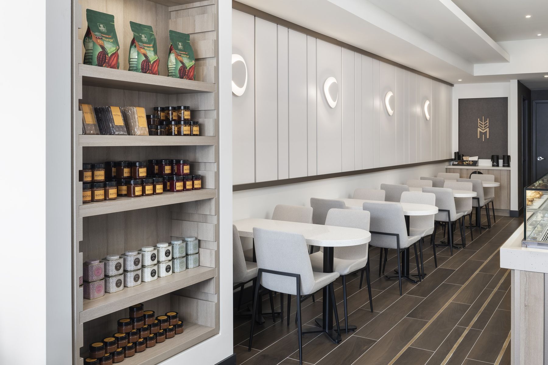 Retail shelving and café — Bomou on Bayview, East York, Toronto — interior design by RZ Interiors