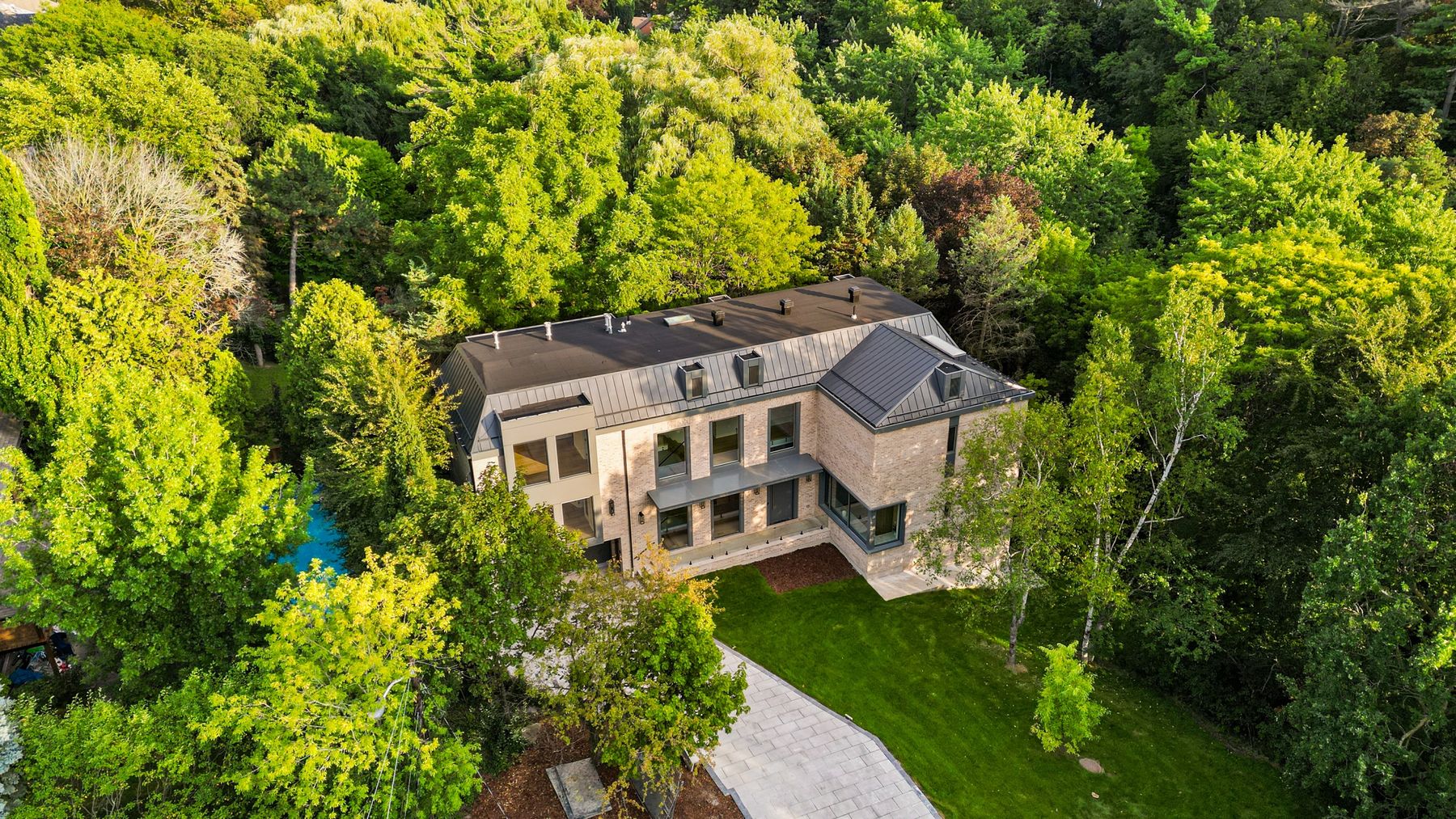 Set into the ravine — The Offset, Toronto — interior design by RZ Interiors