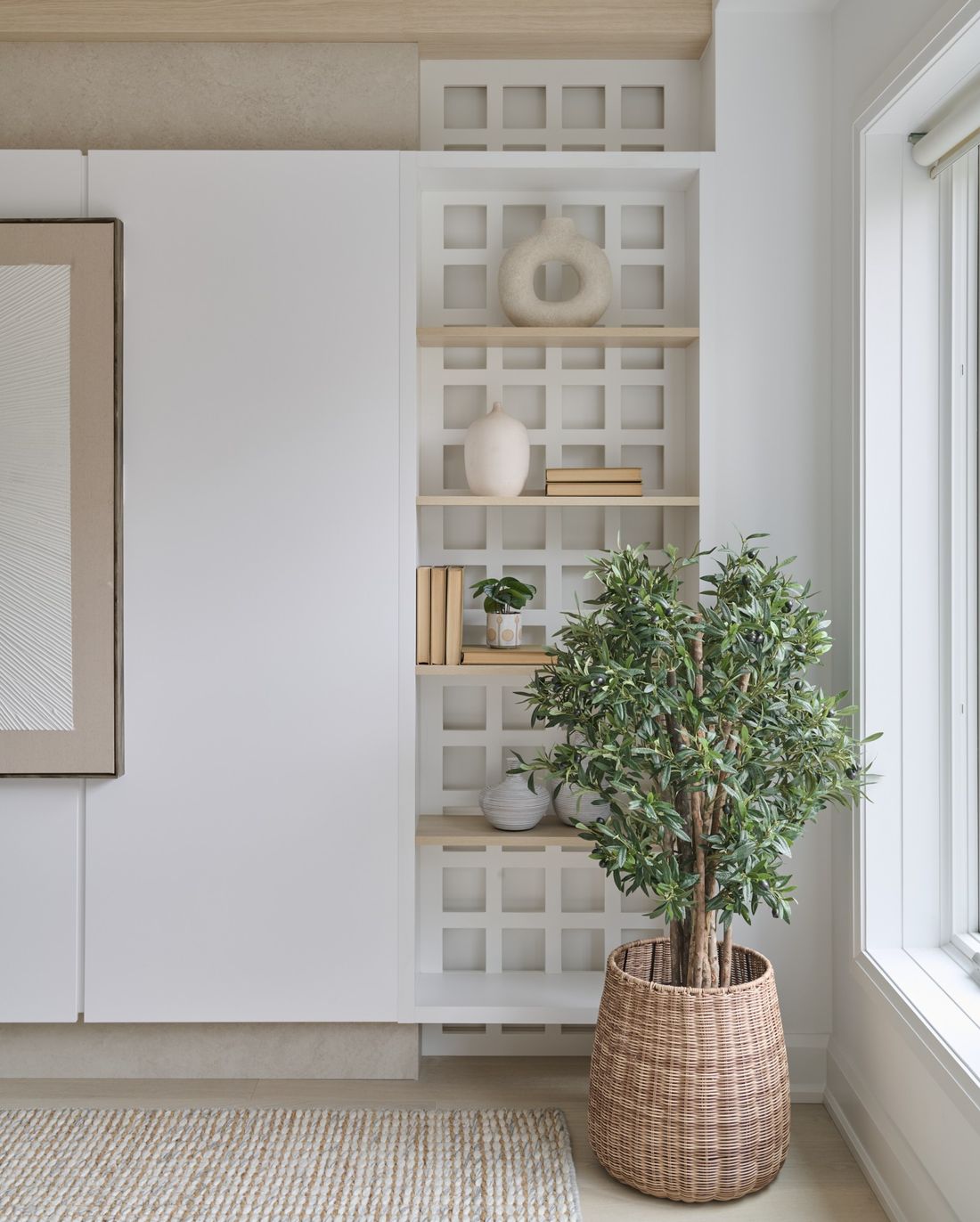 Shelving behind the screen, lights off — The Void — interior design by RZ Interiors