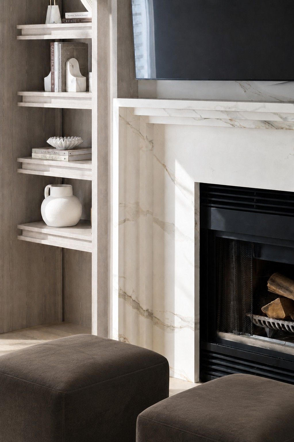 Stone fireplace surround — The Corner House — interior design by RZ Interiors