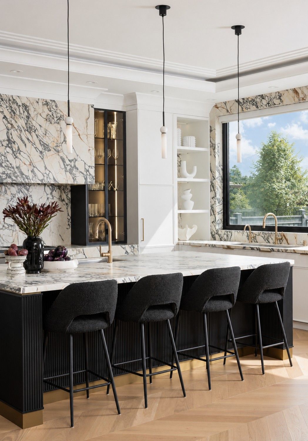 The island in front of the window — The Gathering House, Kleinburg, Vaughan — interior design by RZ Interiors