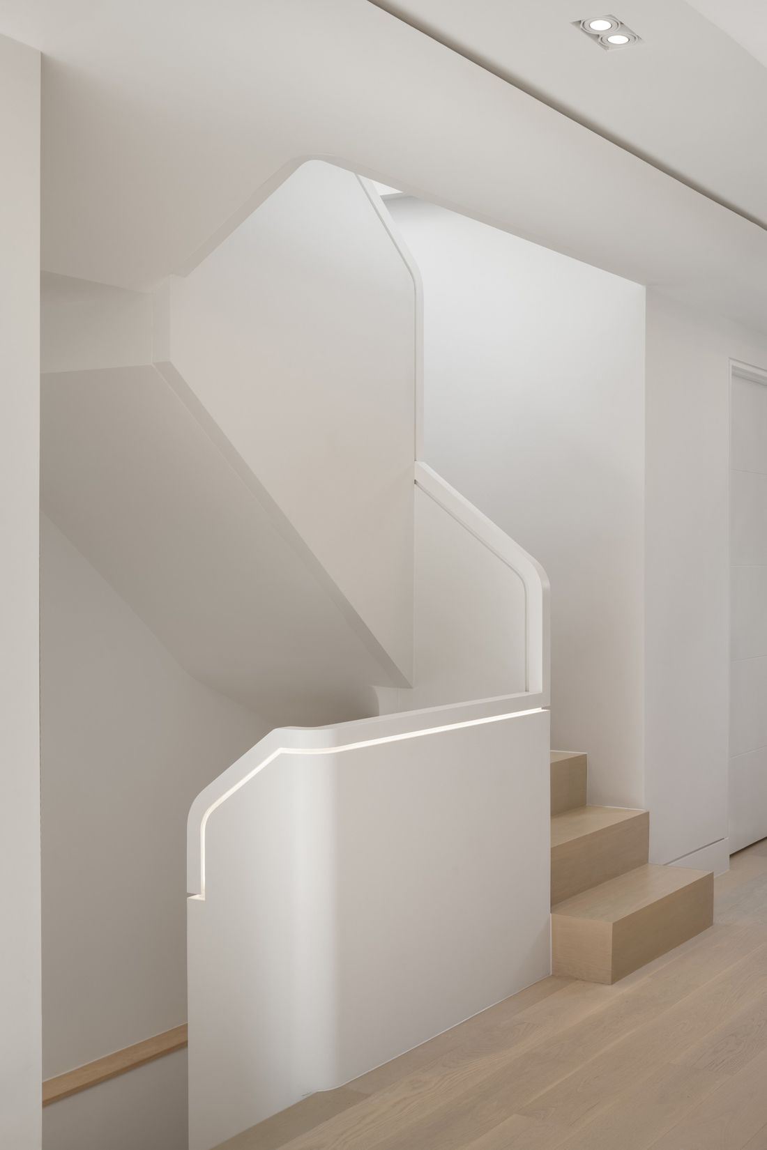 The repositioned staircase — The Open House, Moore Park, Toronto — interior design by RZ Interiors