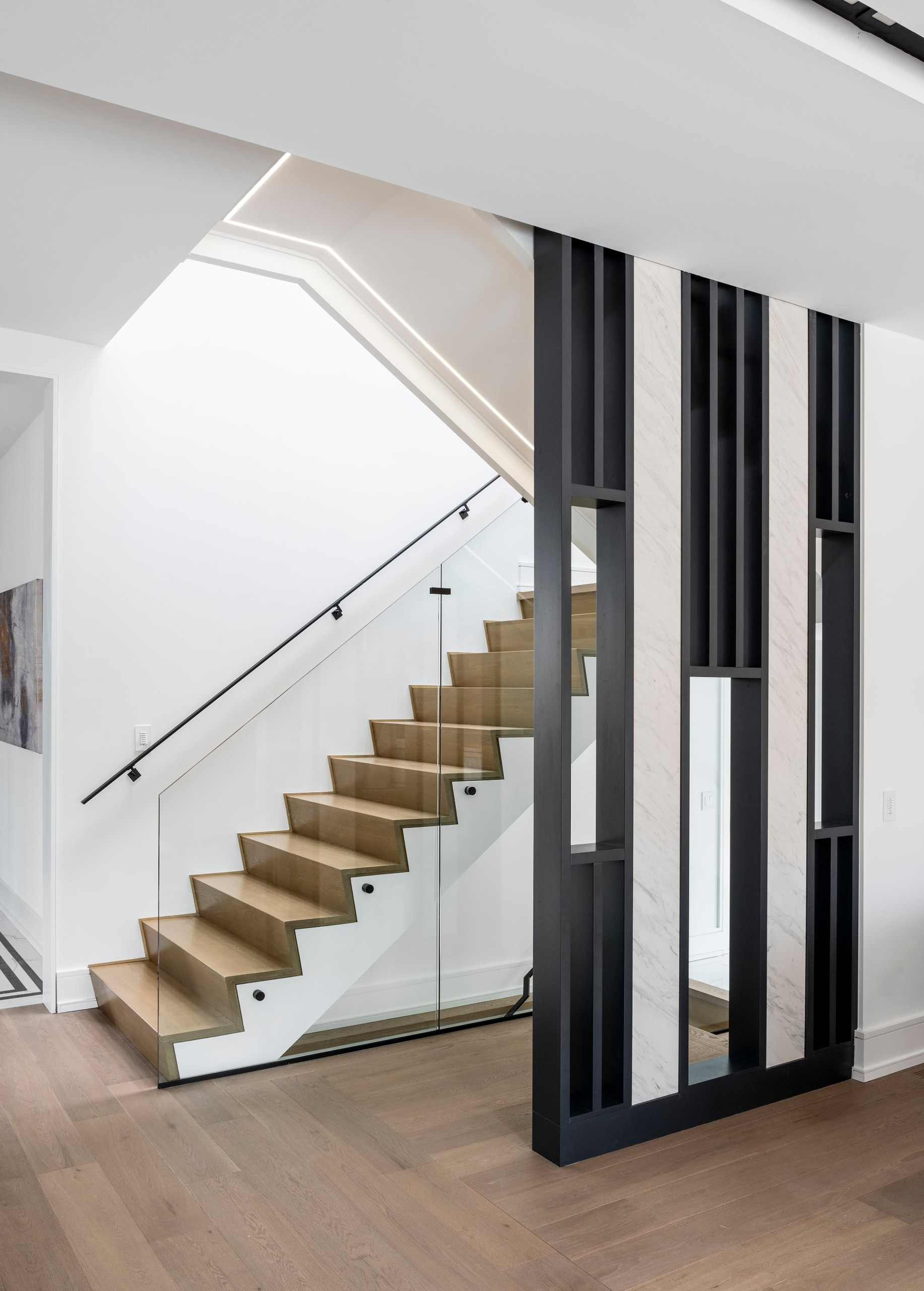 The stair behind the screen — Two Volumes, North York, Toronto — interior design by RZ Interiors