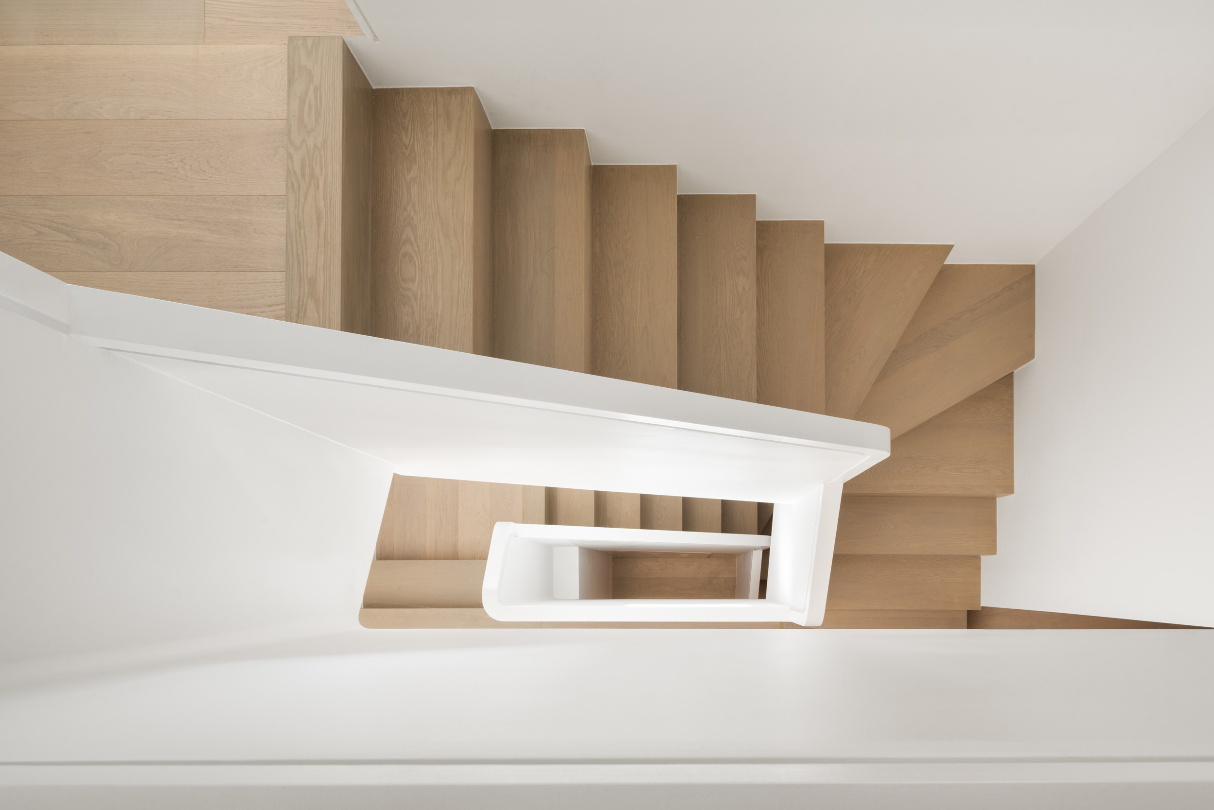 The stair rising to the mezzanine — The Open House, Moore Park, Toronto — interior design by RZ Interiors