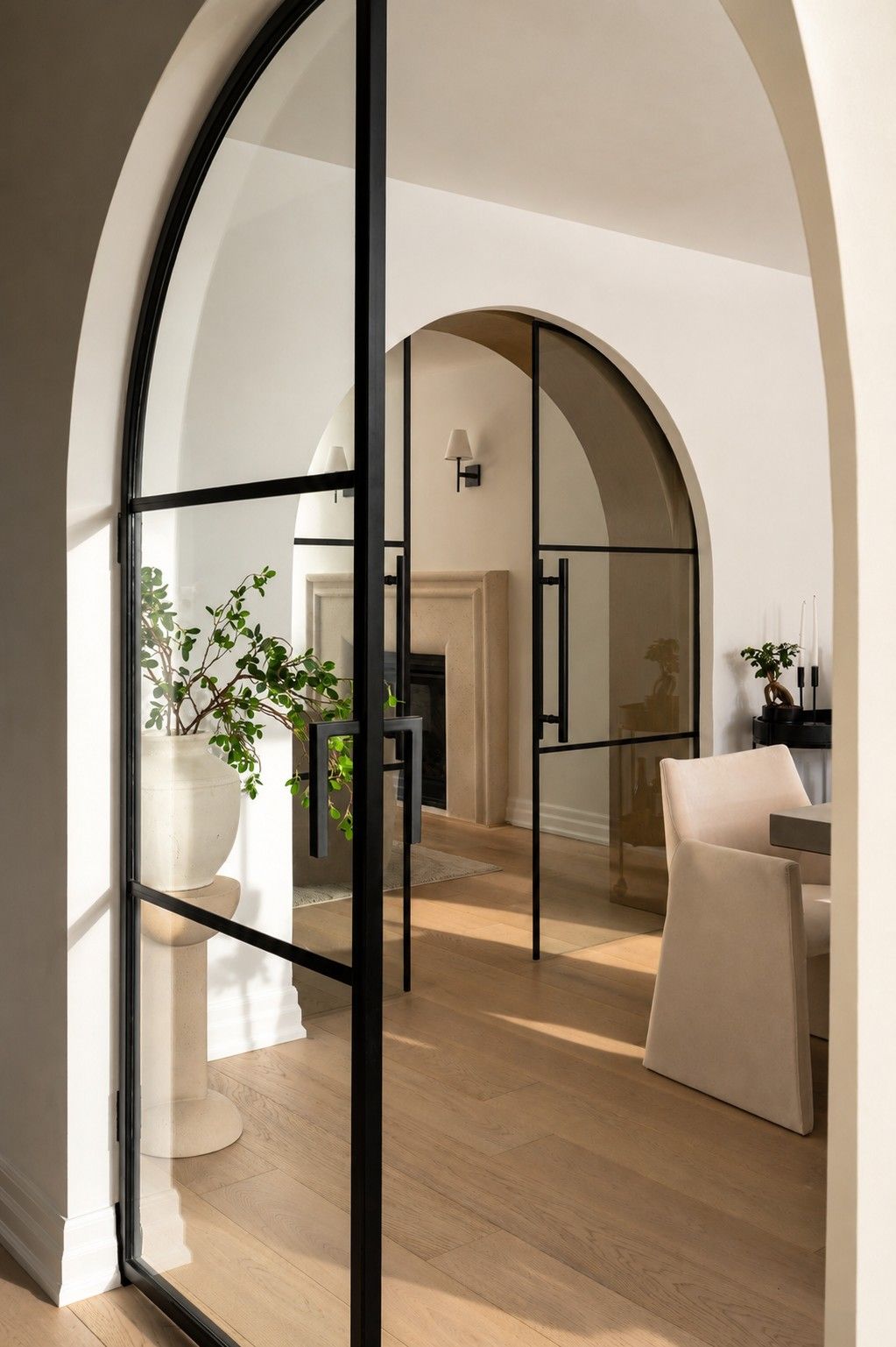 Through the glass archways — Curvilinear Forms, Greater Toronto Area — interior design by RZ Interiors